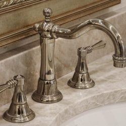 up-close shot of new faucet appliance in master bathroom remodel