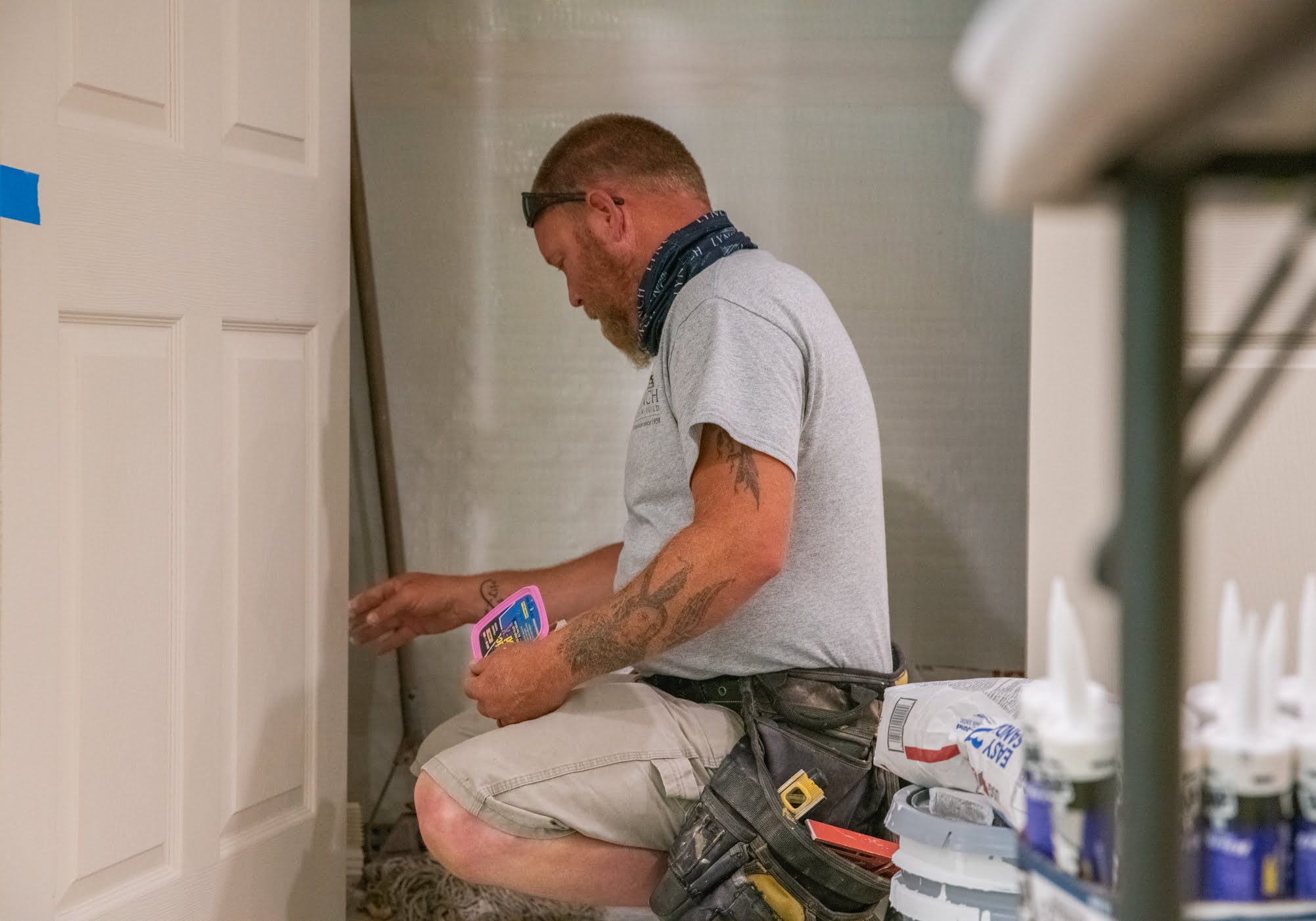 Lynch employee working on paint finishes on a Lynch home remodel project