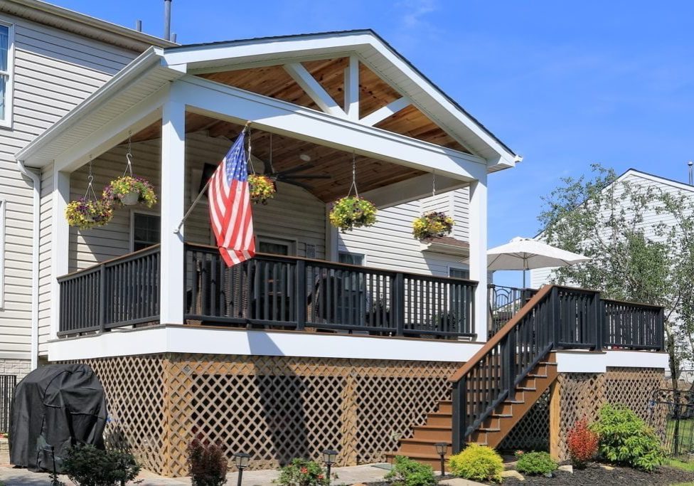 Lynch Design Build exterior architectural and aerial photography of new porch addition by Maryland based Commercial photographers Robin Sommer and Bill Rettberg of MidAtlantic Photographic LLC