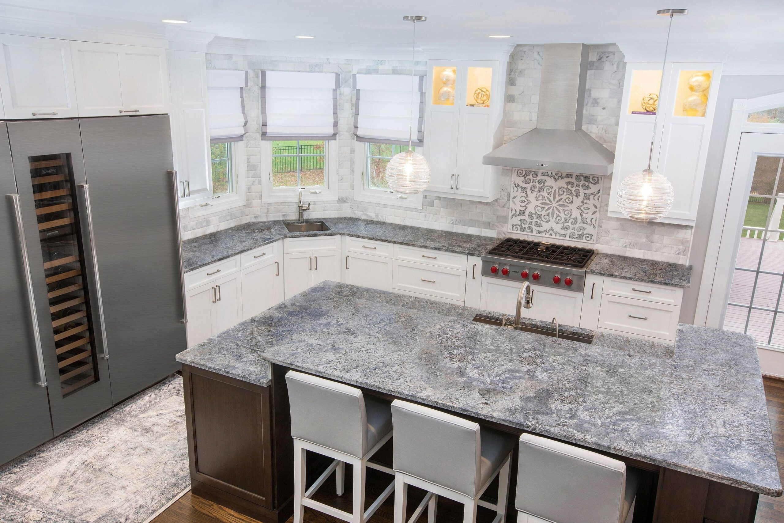 Elegant kitchen remodel in Maryland showcasing a spacious island and detailed finishes