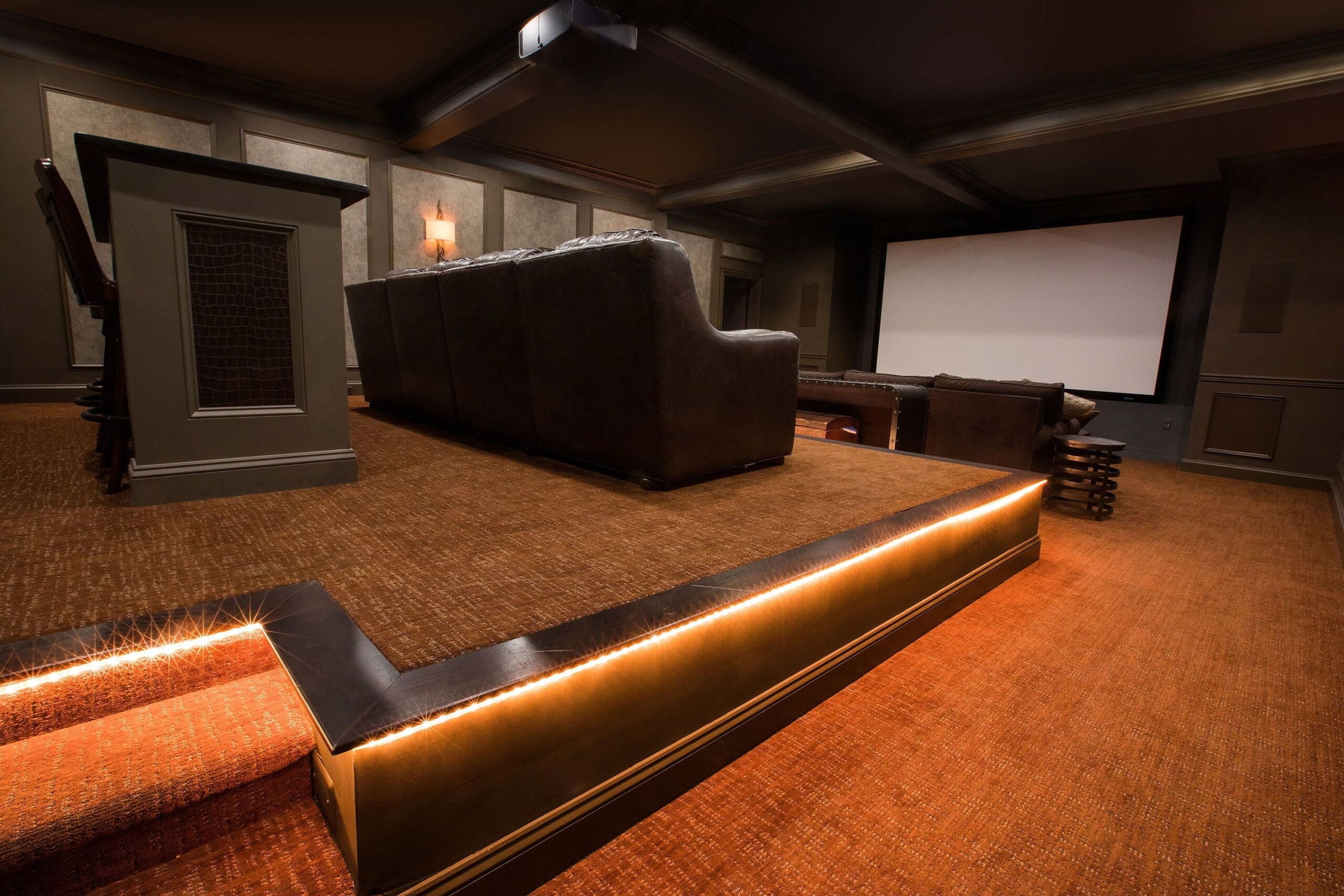 Specialty project in Maryland with home theater platform lighting and high-end leather theater chairs