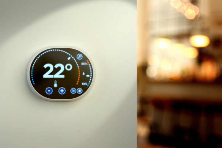Digital thermostat managing a sunroom’s indoor temperature
