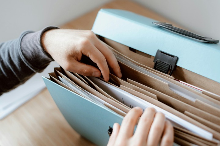 Filing system for kitchen renovation plans, contracts, receipts, and other documents