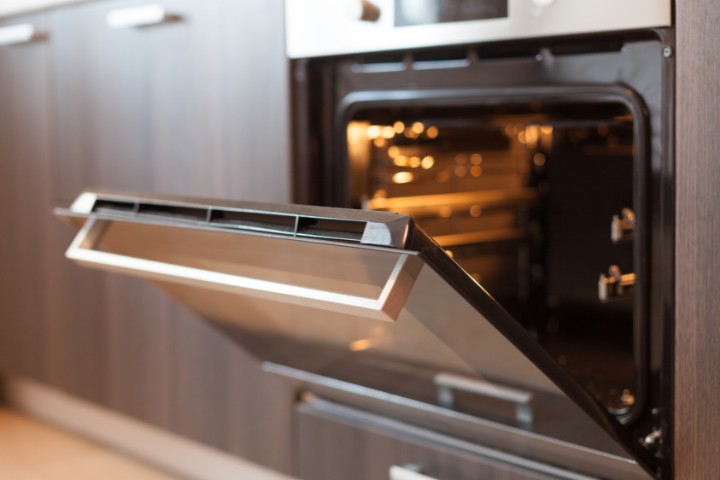 Newly installed modern oven in renovated kitchen