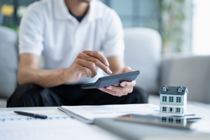 Homeowner reviewing renovation budget for aging in place upgrades