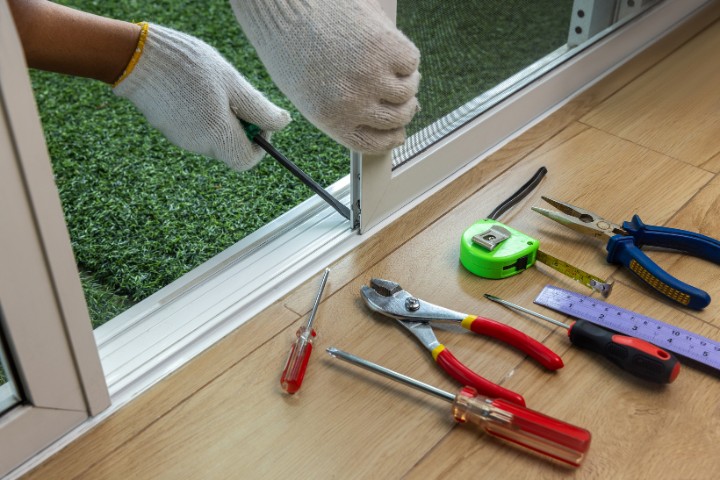 Maintenance work for sliding screen porch entry