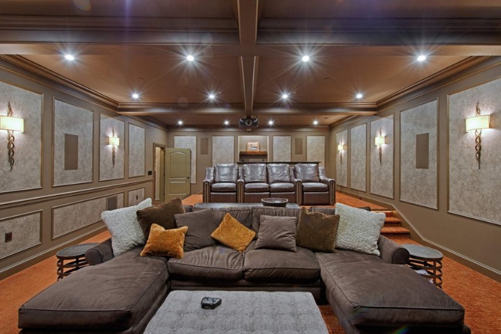 Luxury home theater with tiered seating and ambient lighting specialty remodel project