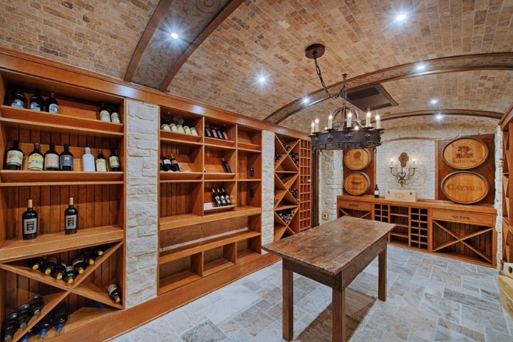 Specialty remodel climate-controlled wine storage room by Lynch Design Build