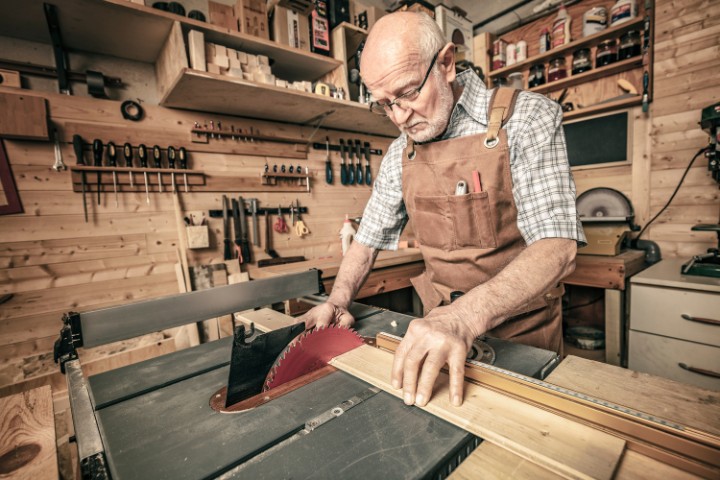 Garage turned into functional woodshop with tools and custom storage