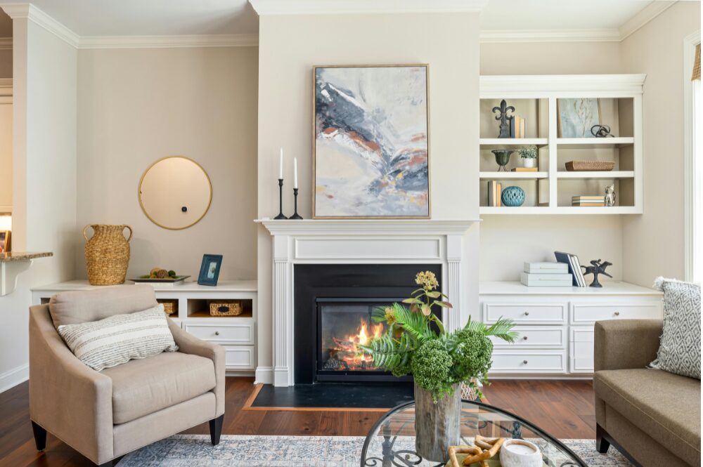 A stylish living room showcasing a fireplace and couch, included in a home renovation checklist.