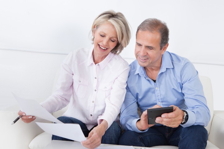 Maryland Homeowners comparing multiple renovation estimates