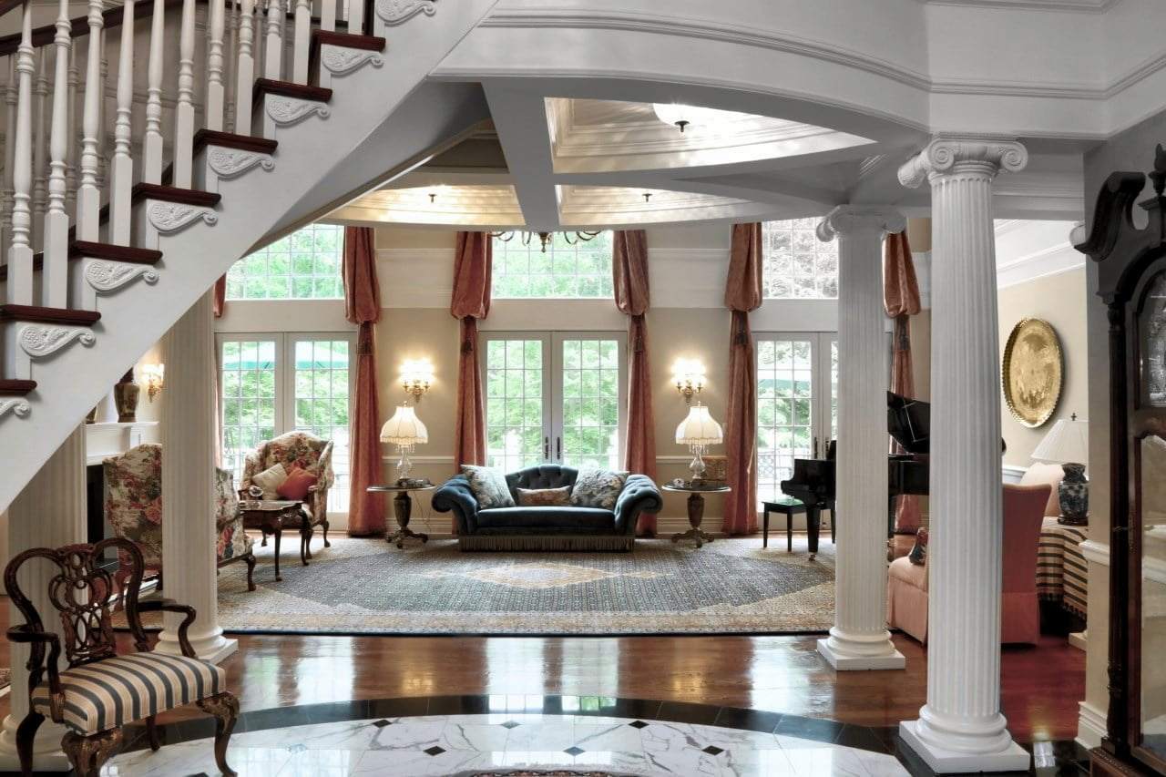 Grand living room interior with classic furniture and architectural detailing