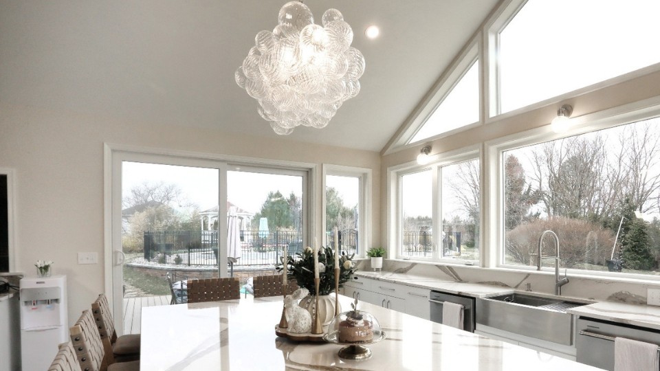 home addition interior design ideas for baltimore homes Bright and airy open plan home addition interior design featuring marble countertops and modern fixtures