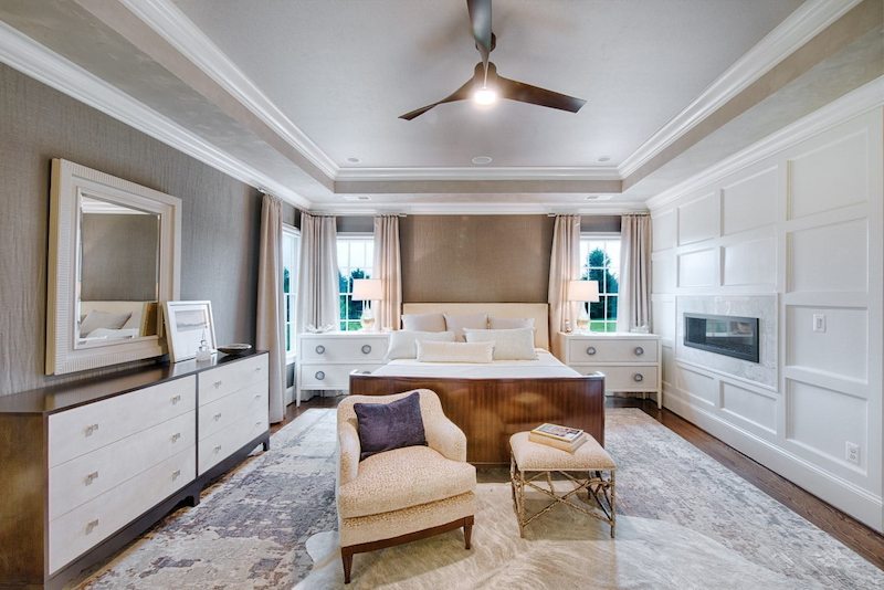 Elegant room addition with modern fireplace and large windows in anne Arundel county