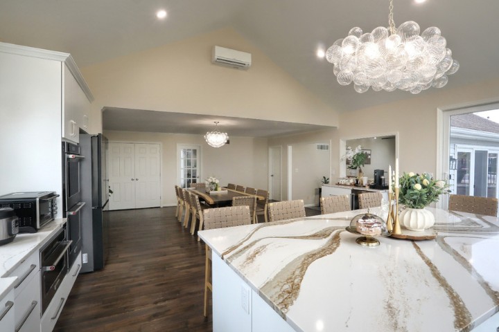Open-concept kitchen design maximizing light and space in a home addition