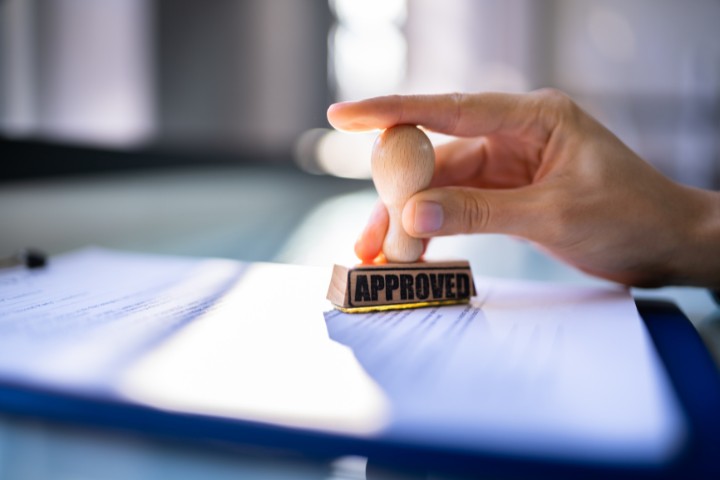 Approved stamp representing bathroom remodeling permit approval in Maryland