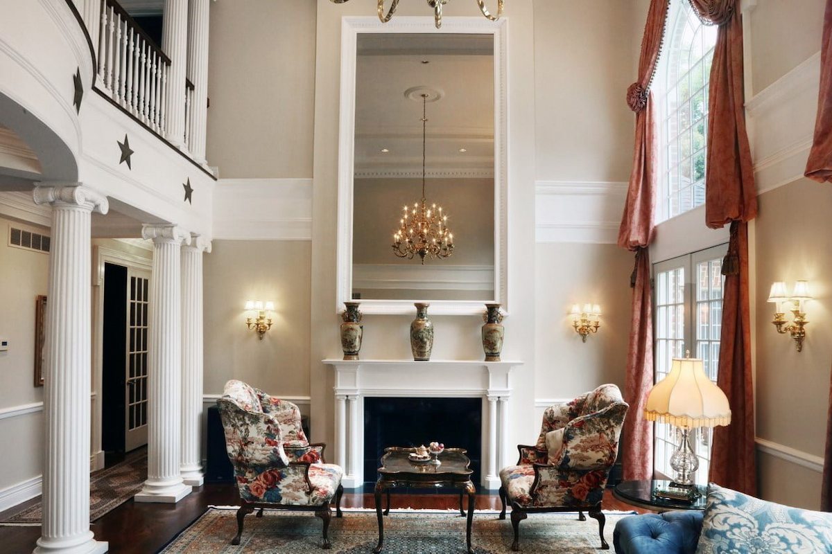 elegant living room renovation with classic columns created by an award winning remodeler in baltimore county Maryland