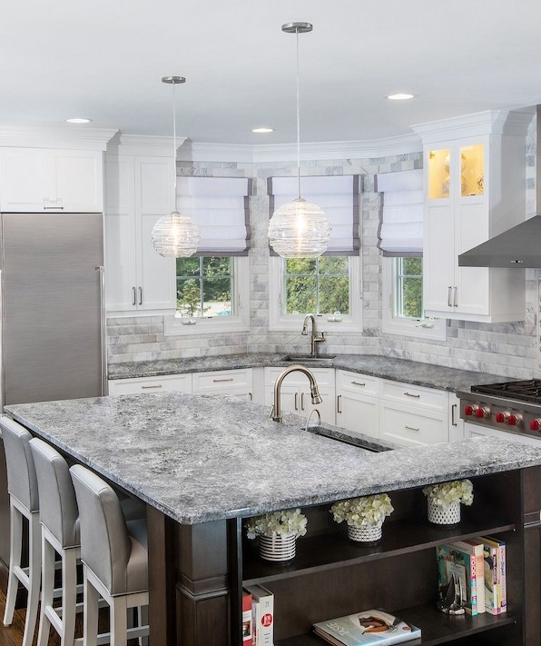 bright modern kitchen with marble counters and stainless appliances in baltimore county md