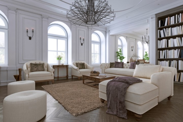 Timeless home interior featuring wooden coffered ceiling, hardwood floors, and built-in shelves