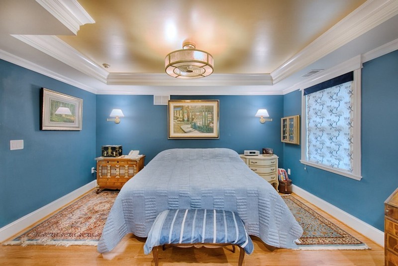 Cozy room addition in Harford County with custom ceiling design and classic furniture