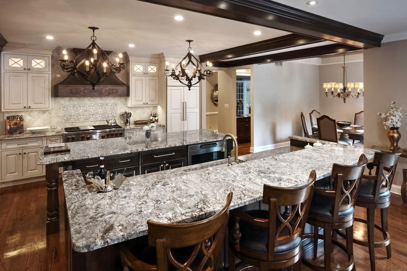 beautifully remodeled gourmet kitchen in howard county with large island double chandeliers and upgraded high end finishes