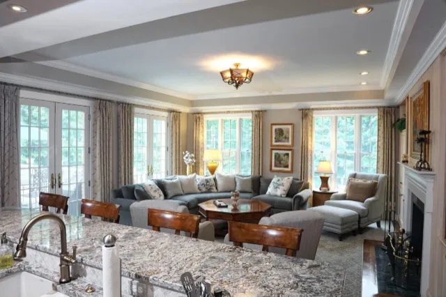 Elegant living room remodel with granite kitchen island and large sectional sofa