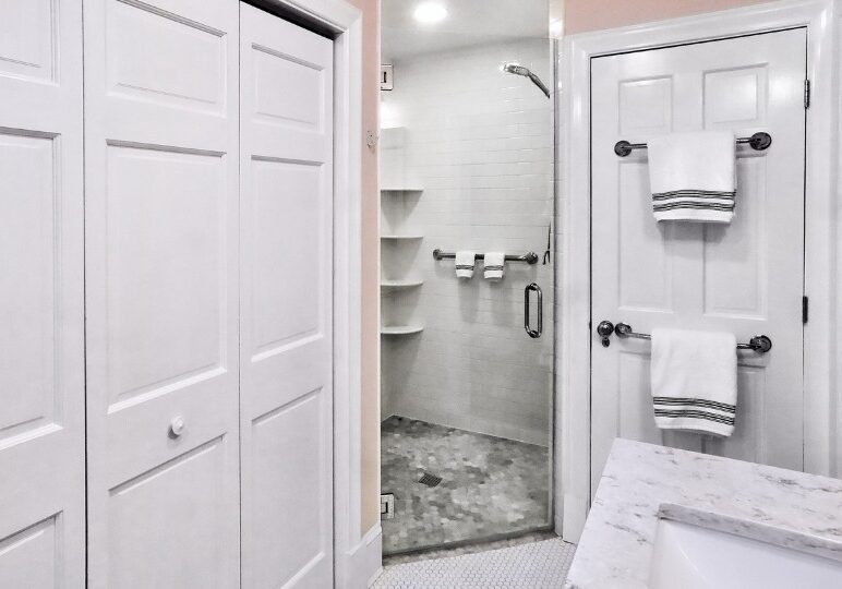 Walk-in shower with grab bars in a Maryland aging in place bathroom remodel