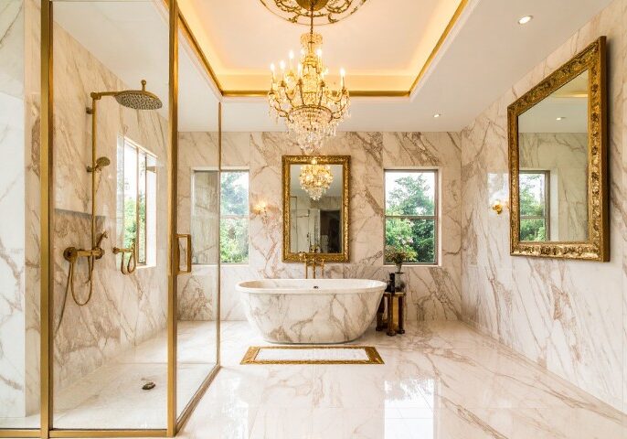 Elegant bathroom remodel with marble finishes and chandelier home decor for a sophisticated timeless look