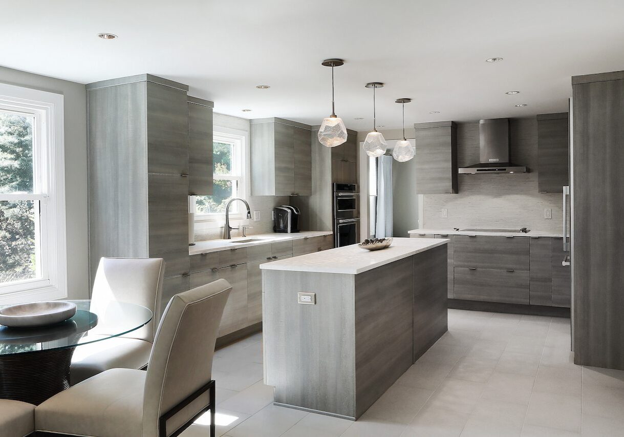 Minimalist kitchen renovation with flat-panel cabinets and neutral finishes in Anne Arundel County